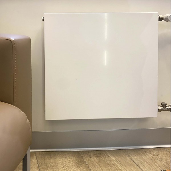 Панельный радиатор Plan Compact (тип 11 высота 500 мм длина 1000 мм) боковое 1/2