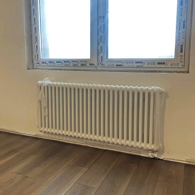 Трубчатый радиатор Rifar Tubog 2057 28 секц. DV1 (2 трубки высота 565 мм 28 секций длина 1288 мм) нижнее 3/4" с вентилем RAL 9016 белый